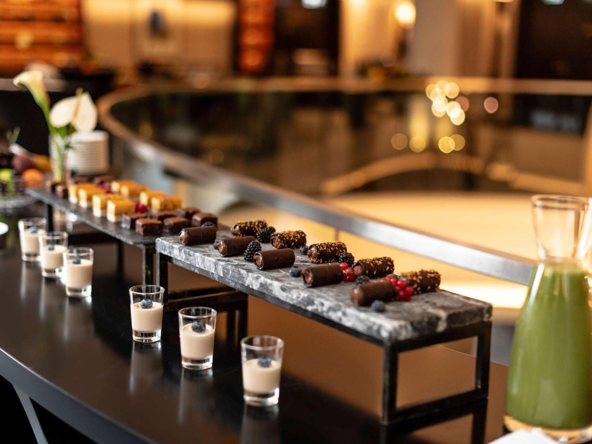 Sofitel Frankfurt Opera Hotel Frankfurt am Main Exterior photo A selection of chocolate and other desserts